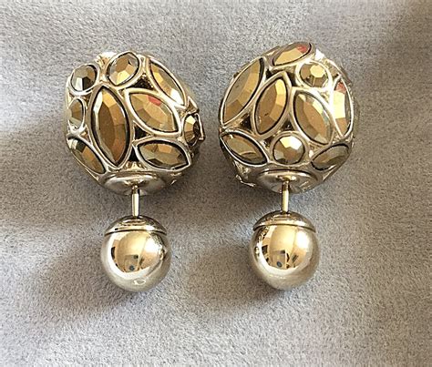 dior tribal earrings silver and gold|Dior tribal earrings shop.